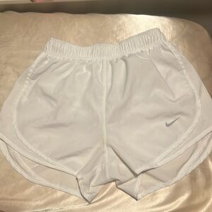 White Nike shorts
